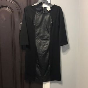 Black dress with faux leather trim